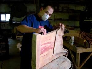 Sanding a pew end piece